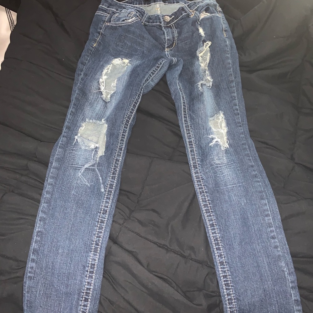 Denim jeans with holes